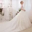 Romantique Champagne Transparentes Robe De Mariée 2018 Robe Boule Encolure Dégagée Sans Manches Dos Nu Appliques En Dentelle Glitter Perlage Cathedral Train Volants