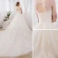 Romantique Champagne Transparentes Robe De Mariée 2018 Robe Boule Encolure Dégagée Sans Manches Dos Nu Appliques En Dentelle Glitter Perlage Cathedral Train Volants
