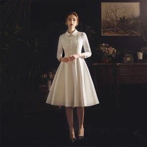 Vintage Originale Ivoire Satin Jardin Extérieur Robe De Mariée 2019 Princesse Col Haut 3 4 Manches Transparentes Dos Nu Boutons Thé Longueur Volants