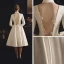 Vintage / Retro Ivory Satin Outdoor / Garden Wedding Dresses 2019 A-Line / Princess High Neck 3/4 Sleeve See-through Backless Buttons Tea-length Ruffle