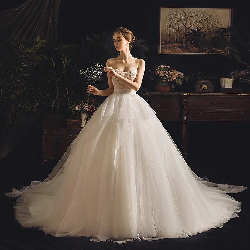 Luksus Elfenben Brudekjoler 2019 Prinsesse Kjæreste Uten Ermer Ryggløse Perle Chapel Train Buste