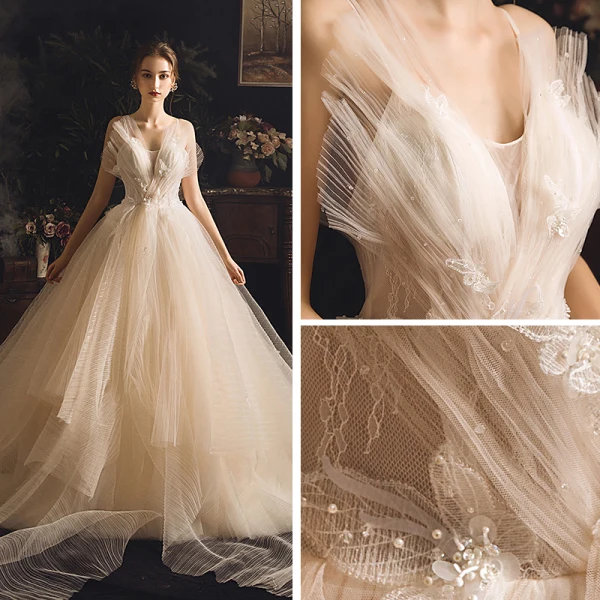 Fabuleux Champagne Robe De Mariée 2019 Princesse Bretelles Spaghetti Sans Manches Dos Nu Cristal Perlage Cathedral Train Volants