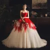 Amazing / Unique Red Champagne Wedding Dresses 2019 Ball Gown Sweetheart Sleeveless Backless Chapel Train Cascading Ruffles