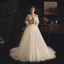 Illusion Champagne Genomskinliga Bröllopsklänningar 2019 Prinsessa Fyrkantig Ringning Långärmad Fjäder Halterneck Appliqués Spets Pierced Beading Domstol Tåg