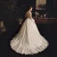Illusion Champagne Genomskinliga Bröllopsklänningar 2019 Prinsessa Fyrkantig Ringning Långärmad Fjäder Halterneck Appliqués Spets Pierced Beading Domstol Tåg