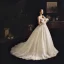 Illusion Champagne Genomskinliga Bröllopsklänningar 2019 Prinsessa Fyrkantig Ringning Långärmad Fjäder Halterneck Appliqués Spets Pierced Beading Domstol Tåg