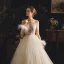 Illusion Champagne Genomskinliga Bröllopsklänningar 2019 Prinsessa Fyrkantig Ringning Långärmad Fjäder Halterneck Appliqués Spets Pierced Beading Domstol Tåg