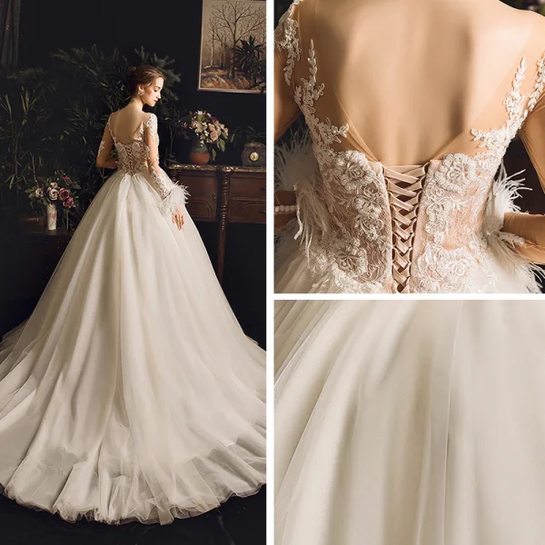 Illusion Champagne Genomskinliga Bröllopsklänningar 2019 Prinsessa Fyrkantig Ringning Långärmad Fjäder Halterneck Appliqués Spets Pierced Beading Domstol Tåg