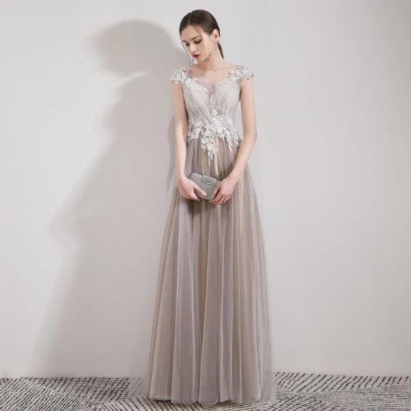 Élégant Champagne Robe De Soirée 2019 Princesse Encolure Dégagée Sans Manches Appliques En Dentelle Perlage Cristal Longue Volants Dos Nu Robe De Ceremonie