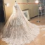 Vintage / Originale Champagne Transparentes Robe De Mariée 2019 Princesse Col Haut Manches Longues Dos Nu Appliques En Dentelle Perlage Longue Volants