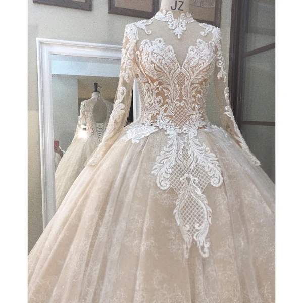 Vintage / Originale Champagne Transparentes Robe De Mariée 2019 Princesse Col Haut Manches Longues Dos Nu Appliques En Dentelle Perlage Longue Volants