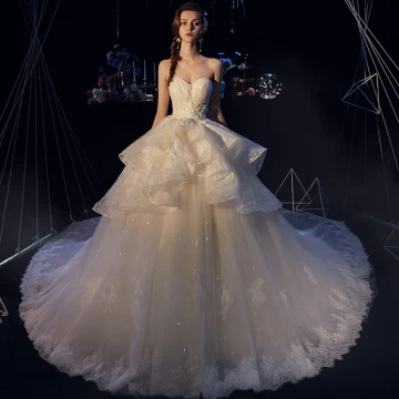 Elegante Ivoor Trouwjurken 2019 Baljurk Geliefde Mouwloos Ruglooze Appliques Kant Glans Tule Cathedral Train Ruche