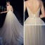 Meilleur Champagne Jardin / Extérieur Robe De Mariée 2019 Princesse Bretelles Spaghetti Transparentes Col v profond Sans Manches Dos Nu Appliques En Dentelle Perlage Perle Glitter Tulle Train De Balayage Volants