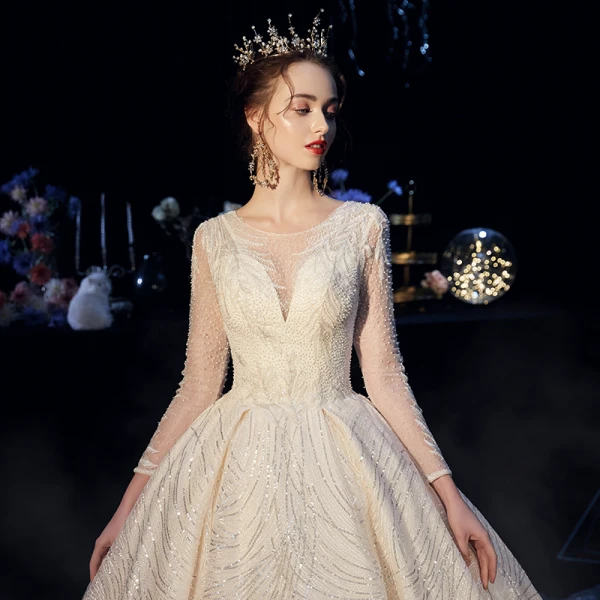 Bling Bling Champagner Durchsichtige Brautkleider / Hochzeitskleider 2019 A Linie Rundhalsausschnitt Lange Ärmel Rückenfreies Perlenstickerei Perle Glanz Pailletten Kathedrale Schleppe Rüschen