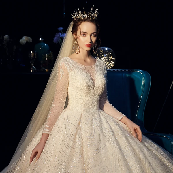 Bling Bling Champagner Durchsichtige Brautkleider / Hochzeitskleider 2019 A Linie Rundhalsausschnitt Lange Ärmel Rückenfreies Perlenstickerei Perle Glanz Pailletten Kathedrale Schleppe Rüschen