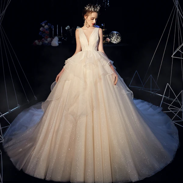 Bling Bling Champagner Organza Brautkleider / Hochzeitskleider 2019 Ballkleid Durchsichtige Tiefer V-Ausschnitt Ärmellos Rückenfreies Glanz Tülle Kathedrale Schleppe Rüschen