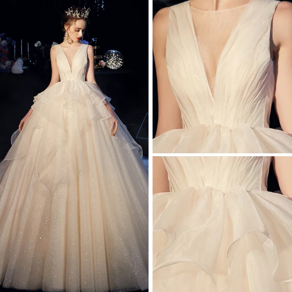 Bling Bling Champagner Organza Brautkleider / Hochzeitskleider 2019 Ballkleid Durchsichtige Tiefer V-Ausschnitt Ärmellos Rückenfreies Glanz Tülle Kathedrale Schleppe Rüschen