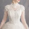 Affordable Champagne See-through Outdoor / Garden Wedding Dresses 2019 Ball Gown High Neck Bell sleeves Backless Appliques Lace Pearl Beading Floor-Length / Long Ruffle