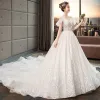 Illusion Ivory Wedding Dresses 2019 A-Line / Princess V-Neck Short Sleeve Backless Appliques Lace Beading Chapel Train Ruffle