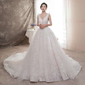 Best Champagne Wedding Dresses 2019 A Line Princess Deep V Neck Sleeveless Backless Appliques Lace Beading Chapel Train Ruffle