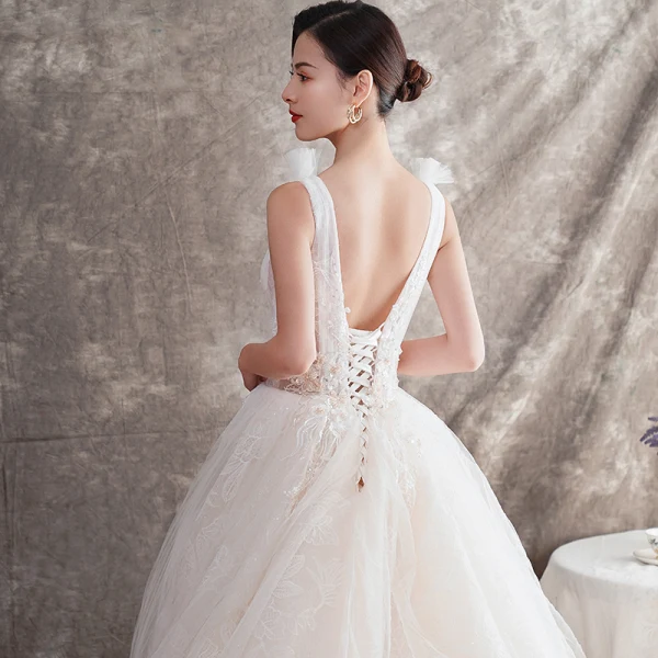Best Champagne Wedding Dresses 2019 A-Line / Princess Deep V-Neck Sleeveless Backless Appliques Lace Beading Chapel Train Ruffle