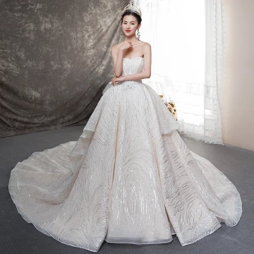 Bling Bling Champagne Bröllopsklänningar 2019 Balklänning Älskling Ärmlös Halterneck Rosett Glittriga Glitter Tyll Cathedral Train Ruffle