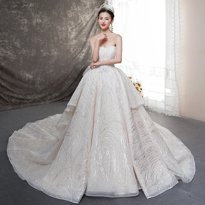 Bling Bling Champagne Brudekjoler 2019 Ballkjole Kjæreste Uten Ermer Ryggløse Sløyfe Glitter Tyll Cathedral Train Buste