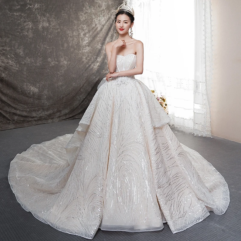 Bling Bling Champagne Brudekjoler 2019 Ballkjole Kjæreste Uten Ermer Ryggløse Sløyfe Glitter Tyll Cathedral Train Buste