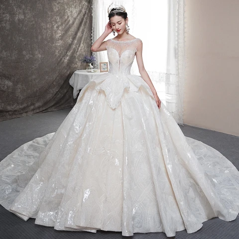 Luxe Champagne Transparentes Robe De Mariée 2019 Robe Boule Encolure Carrée Sans Manches Dos Nu Perlage Glitter Tulle Cathedral Train Volants