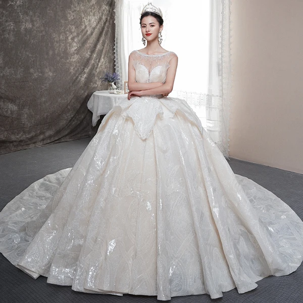 Luxe Champagne Transparentes Robe De Mariée 2019 Robe Boule Encolure Carrée Sans Manches Dos Nu Perlage Glitter Tulle Cathedral Train Volants