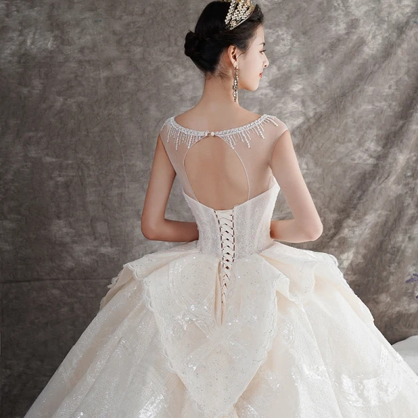 Luxe Champagne Transparentes Robe De Mariée 2019 Robe Boule Encolure Carrée Sans Manches Dos Nu Perlage Glitter Tulle Cathedral Train Volants