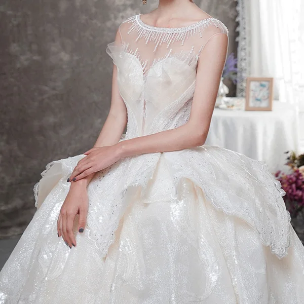 Luxe Champagne Transparentes Robe De Mariée 2019 Robe Boule Encolure Carrée Sans Manches Dos Nu Perlage Glitter Tulle Cathedral Train Volants