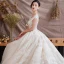 Illusion Champagne Transparentes Robe De Mariée 2019 Princesse Encolure Dégagée Mancherons Dos Nu Appliques En Dentelle Faux Diamant Perlage Glitter Tulle Cathedral Train Volants