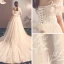 Elegante Champagner Durchsichtige Brautkleider / Hochzeitskleider 2019 A Linie Rundhalsausschnitt Kurze Ärmel Rückenfreies Schleife Applikationen Spitze Kapelle-Schleppe Rüschen