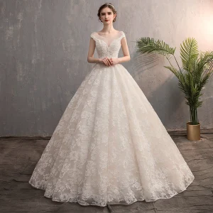 Best Champagne Wedding Dresses 2019 A Line Princess See Through V Neck Cap Sleeves Backless Appliques Lace Beading Court Train Ruffle