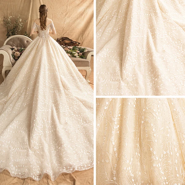 Élégant Champagne Robe De Mariée 2019 Princesse De l'épaule Manches Courtes Dos Nu Perlage Gland Glitter Paillettes Chapel Train Volants