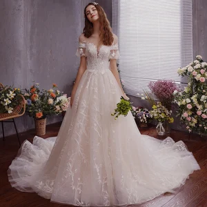 Chic Beautiful Ivory See Through Wedding Dresses 2019 A Line Princess Scoop Neck Short Sleeve Backless Appliques Lace Court Train Ruffle