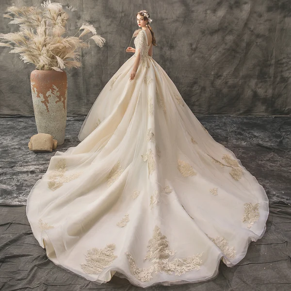 Chic / Beautiful Champagne Wedding Dresses 2019 A-Line / Princess V-Neck Short Sleeve Backless Beading Tassel Appliques Lace Cathedral Train Ruffle