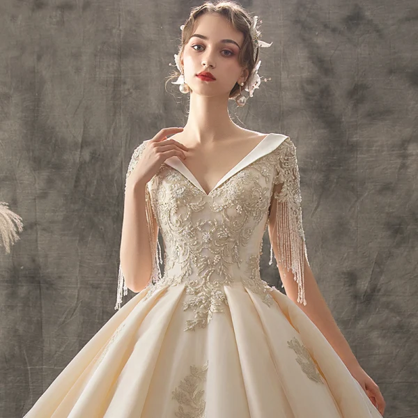 Chic / Beautiful Champagne Wedding Dresses 2019 A-Line / Princess V-Neck Short Sleeve Backless Beading Tassel Appliques Lace Cathedral Train Ruffle