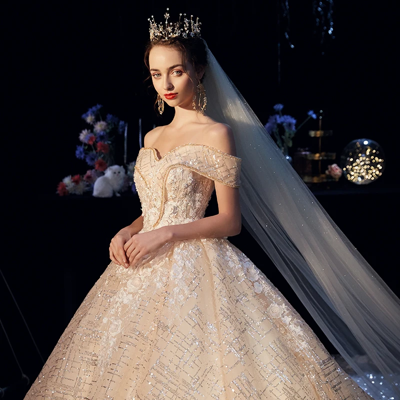 Sparkly Champagne Wedding Dresses 2019 A Line Princess Off The Shoulder  Short Sleeve Backless Appliques Lace Glitter Tulle Cathedral Train Ruffle