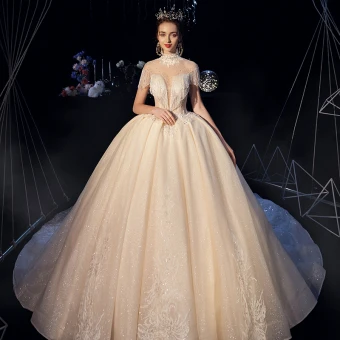 Fabuleux Champagne Transparentes Robe De Mariée 2019 Robe Boule Col Haut Manches Courtes Dos Nu Appliques En Dentelle Perlage Glitter Tulle Cathedral Train Volants