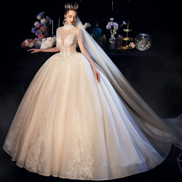 Fabuleux Champagne Transparentes Robe De Mariée 2019 Robe Boule Col Haut Manches Courtes Dos Nu Appliques En Dentelle Perlage Glitter Tulle Cathedral Train Volants