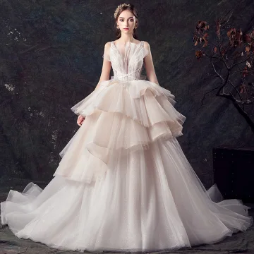 Chic Belle Champagne Transparentes Robe De Mariée 2019 Robe Boule Col V Profond Sans Manches Dos Nu Glitter Tulle Perlage Tribunal Train Volants En Cascade
