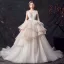 Schöne Champagner Durchsichtige Brautkleider / Hochzeitskleider 2019 Ballkleid Tiefer V-Ausschnitt Ärmellos Rückenfreies Glanz Tülle Perlenstickerei Hof-Schleppe Fallende Rüsche