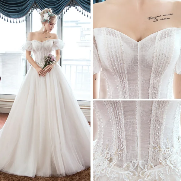 Élégant Ivoire Jardin / Extérieur Robe De Mariée 2019 Princesse De l'épaule Gonflée Manches Courtes Dos Nu Appliques En Dentelle Train De Balayage Volants