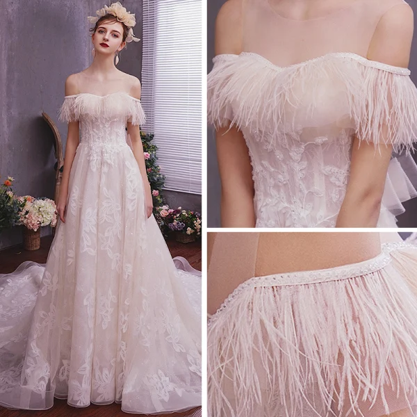 Élégant Champagne Robe De Mariée 2019 Princesse Transparentes Encolure Dégagée Manches Courtes Dos Nu Appliques En Dentelle Plumes Glitter Tulle Tribunal Train Volants