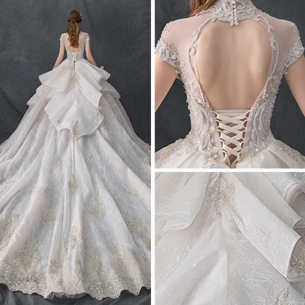 Luxury / Gorgeous Vintage / Retro Champagne See-through Wedding Dresses 2019 Ball Gown High Neck Cap Sleeves Backless Appliques Lace Handmade  Beading Cathedral Train Ruffle