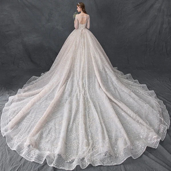 Luxury / Gorgeous Champagne See-through Wedding Dresses 2019 Ball Gown Scoop Neck 3/4 Sleeve Backless Handmade  Beading Glitter Tulle Cathedral Train Ruffle
