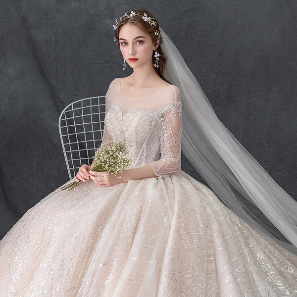 Luxury / Gorgeous Champagne See-through Wedding Dresses 2019 Ball Gown Scoop Neck 3/4 Sleeve Backless Handmade  Beading Glitter Tulle Cathedral Train Ruffle