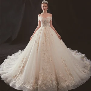 Luxe Champagne Robe De Mariée 2019 Princesse De L 039 Épaule Manches Courtes Dos Nu Appliques En Dentelle Perlage Faux Diamant Glitter Tulle Cathedral Train Volants